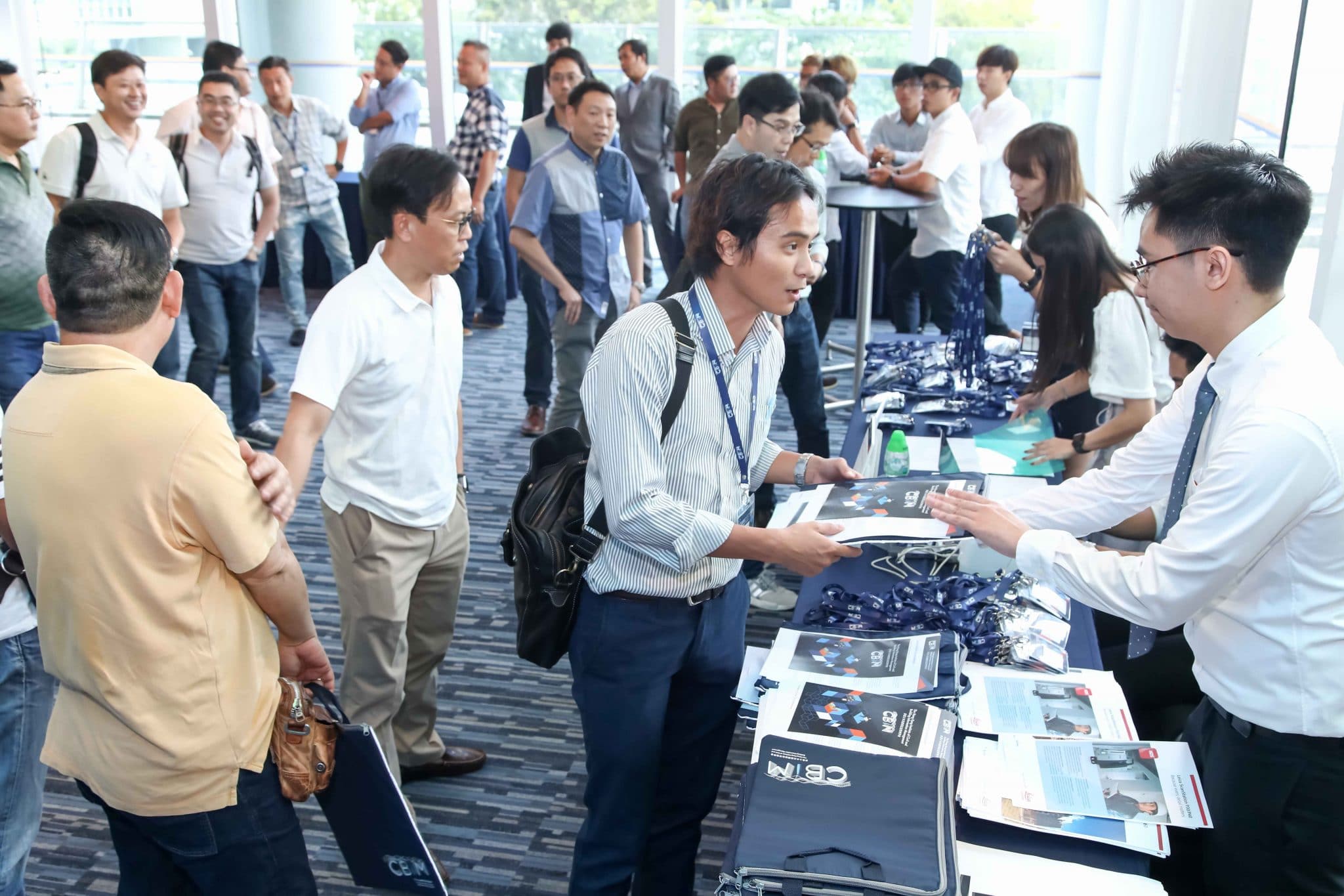 Guests queued up at reception table.
